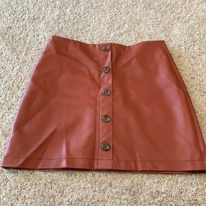Burnt orange faux leather skirt
